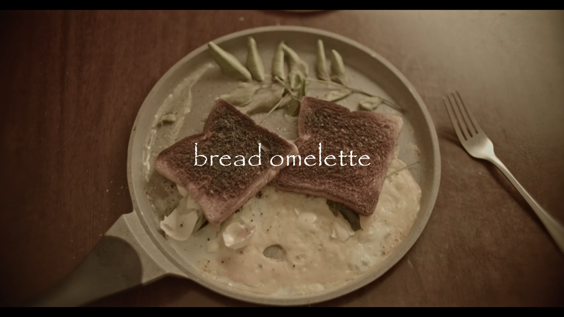 Bread Omelette title over a plate of food